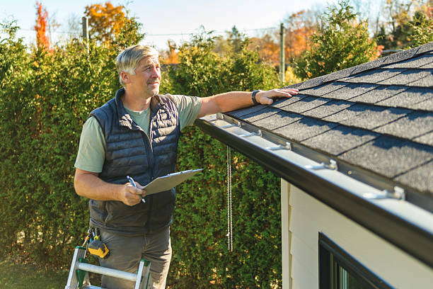 Professional Roof Replacement technician working in Leonard, MI